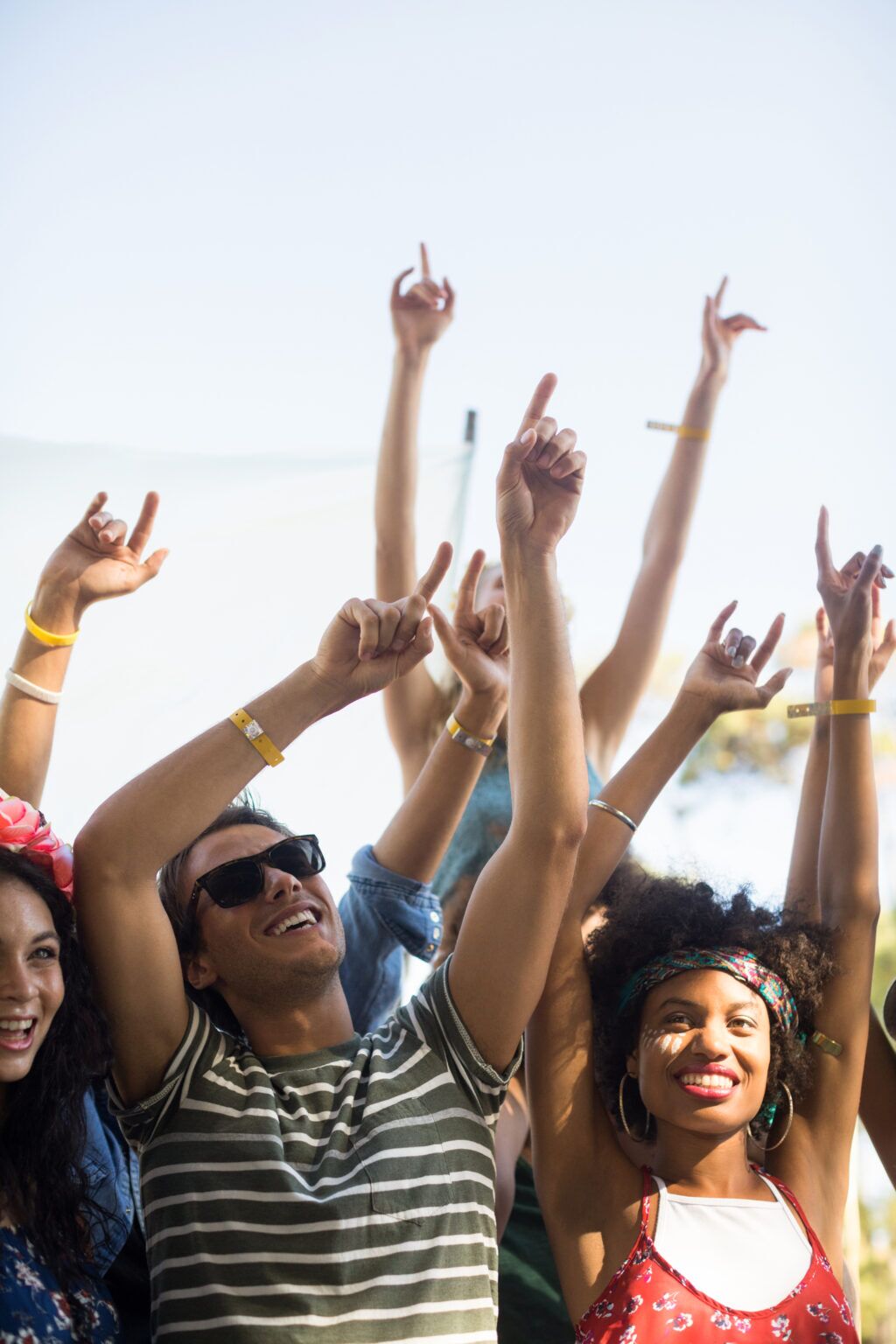 People with their hands in the air dancing to Good Company Entertainment Group in Edmonton
