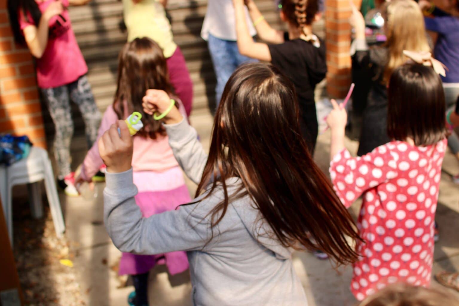 Kids dancing at school dance to music supplied by Good Company Entertainment Group in Edmonton