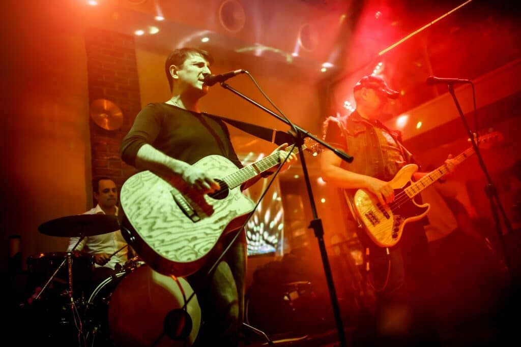 Band playing Edmonton venue stage because of Good Company Entertainment Group artist support and management services