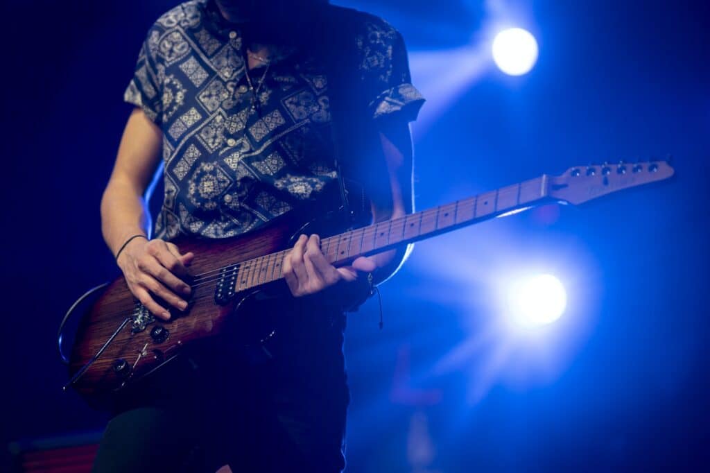 Guitarist in concert in Edmonton who was booked through Good Company Entertainment Group and their artist support and management services