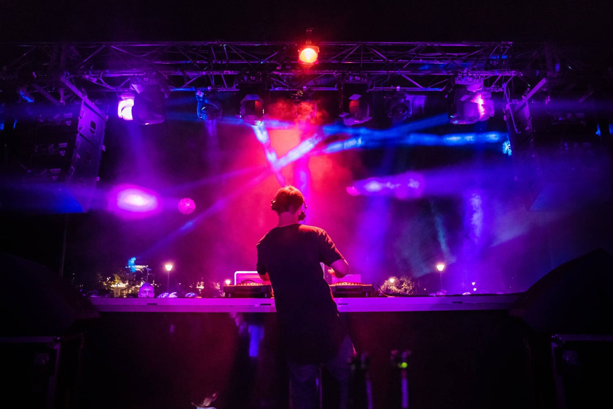 DJ playing on stage with audio and visual production provided by Good Company Entertainment Group in Edmonton