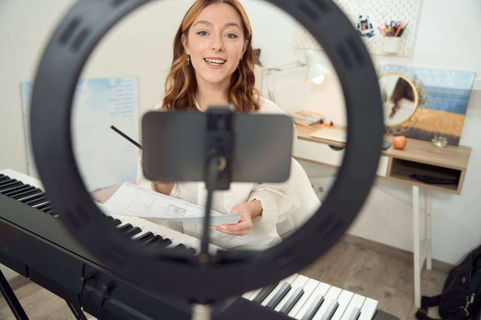 Female musician getting promotion and marketing advice from Good Company Entertainment Group's artist support and management services in Edmonton